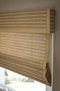 A close-up image of a natural woven window shade.